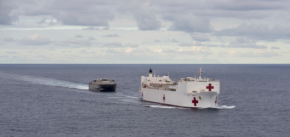 The Military Sealift Command hospital ship USNS Mercy (T-AH 19) and the Joint High Speed Vessel USNS Millinocket (JHSV 3) participates in Pacific Partnership 2015