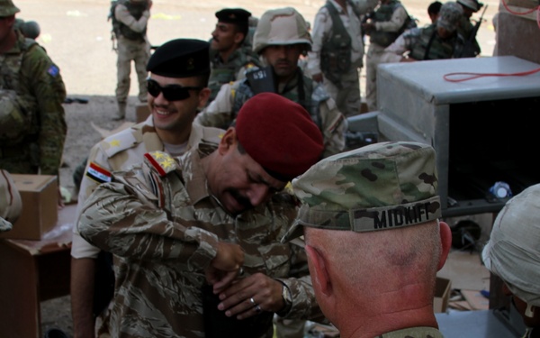 Iraqi Infantry Brigade receives equipment