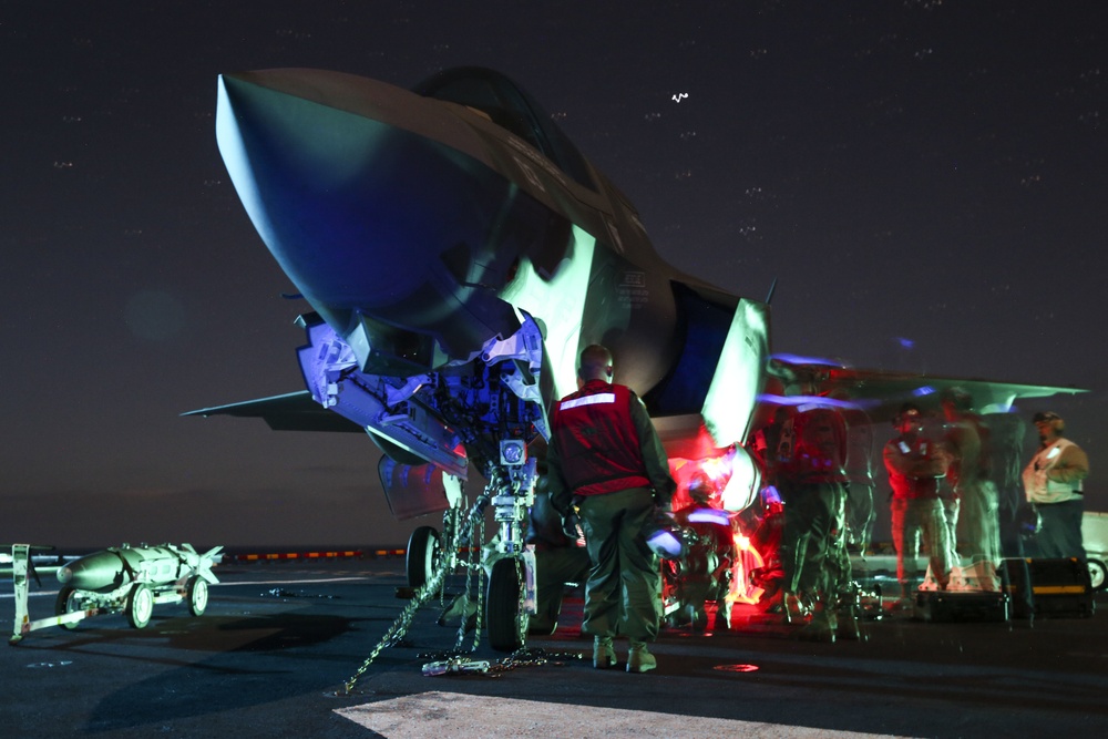 Marines conduct night ordnance load on F-35B at sea