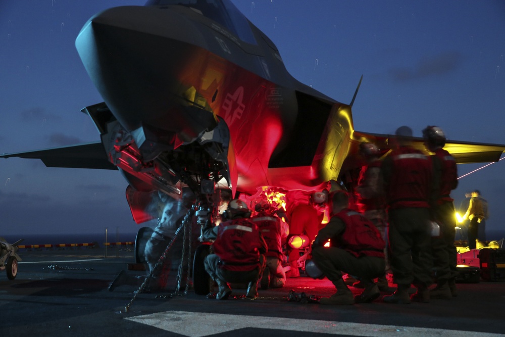 Marines conduct night ordnance load on F-35B at sea