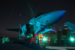 Marines conduct night ordnance load on F-35B at sea