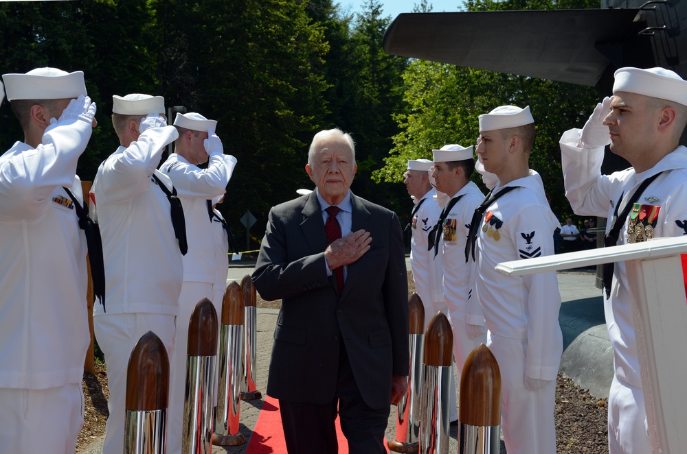 Former President Carter arrives for USS Jimmy Carter change Of command