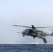 U.S. Marines go toe first from helicopters into the Gulf of Aden