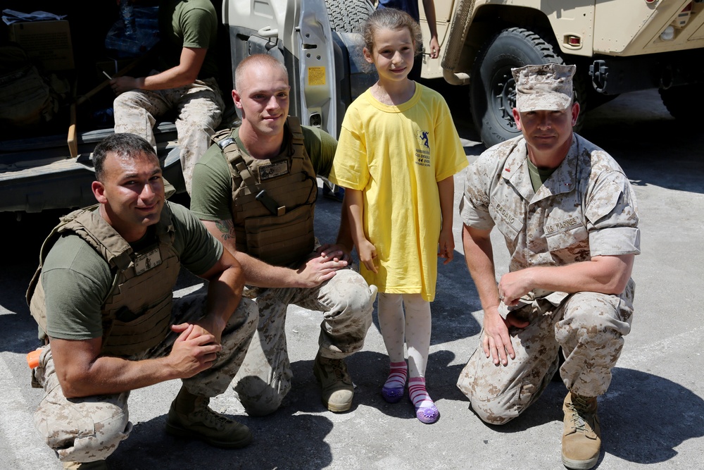 U.S. Marines, Romanian soldiers volunteer at City Days