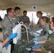 EMT personnel transferring patients to the ICU