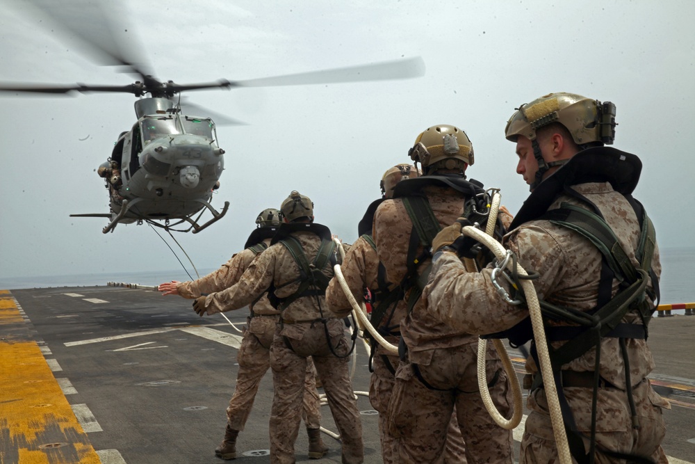 Marines with the MRF conduct special patrol insertion/extraction training from a UH-1Y Huey