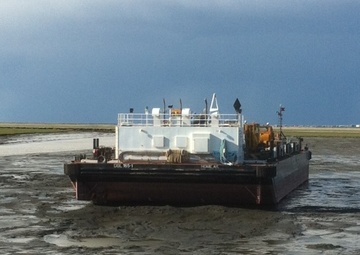 Coast Guard monitoring response to grounded barge near Bethel, Alaska