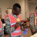 Quick Response Force prepares to set out for wellness checks during training exercise