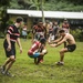 Americans and Fijians play rugby during Pacific Partnership 2015