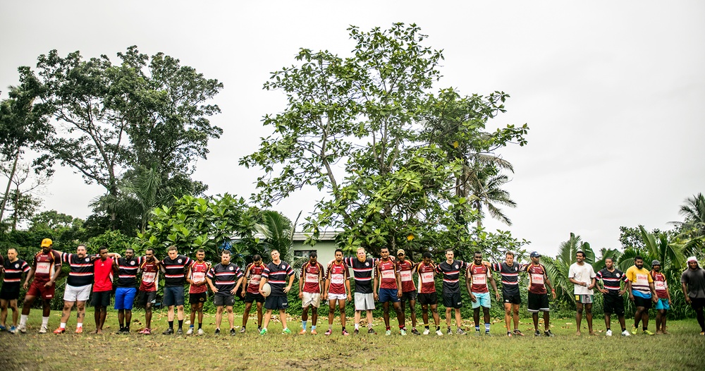Americans and Fijians play rugby during Pacific Partnership 2015