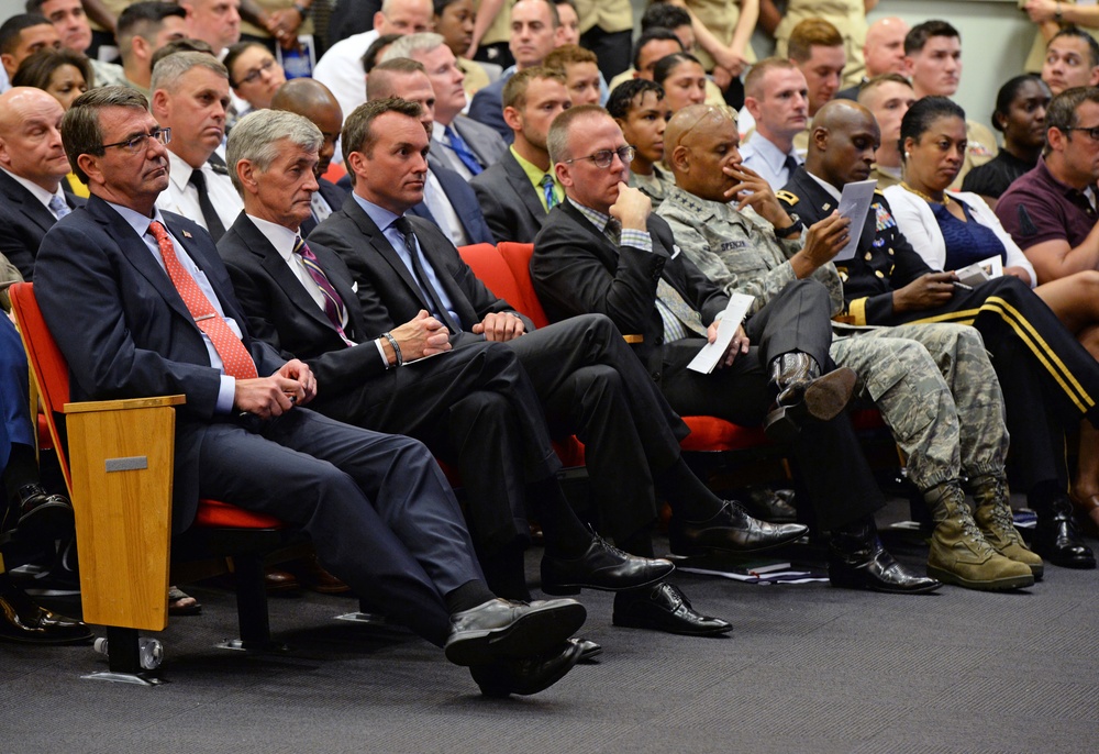 Secretary of defense listens to a panel of service members tell their story during the LGBT Pride Month