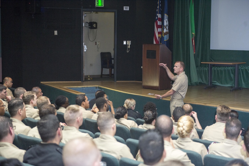 Fleet Master Chief Steven S. Giordano speaks to Naval Telecommunications Station Sailors