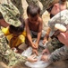 Pacific Partnership medical team builds handwashing station