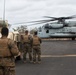 Marines with MRF-D  assist in the refueling of vehicles by helicopter