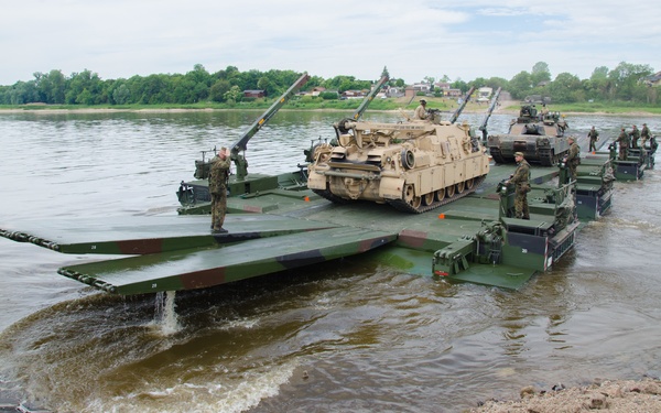 Multinational units conduct assault river crossing operations