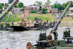 Multinational units conduct assault river crossing operations