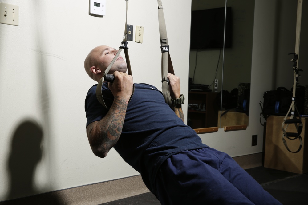 Fire personnel aboard Marine Corps Logistics Base Barstow, Calif., engage in various types of workouts, but lately, they have taken 'hanging out at the gym' to a whole new level with TRX suspension training