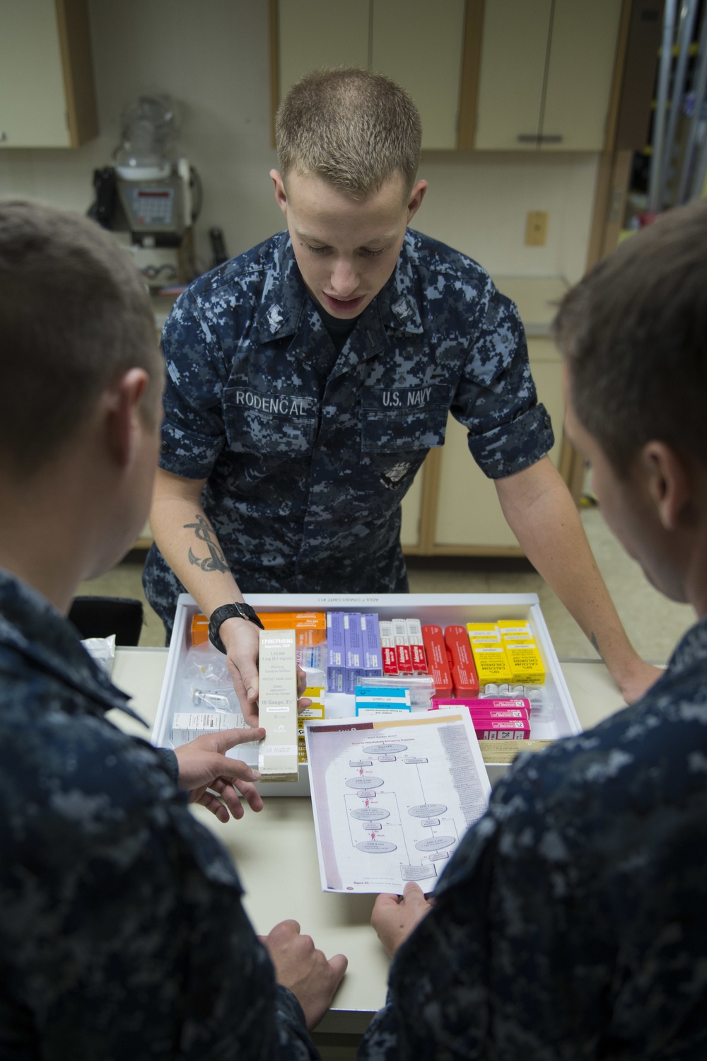 USNS Mercy medical personnel check equipment