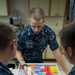 USNS Mercy medical personnel check equipment