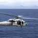 U.S. Marine Harrier pilots ensure landing skills are sharp at sea