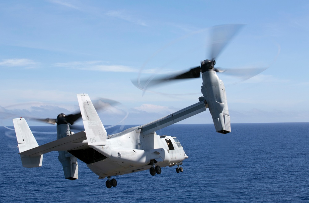 U.S. Marine Harrier pilots ensure landing skills are sharp at sea