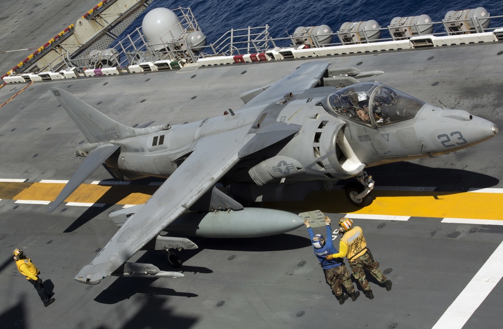 U.S. Marine Harrier pilots ensure landing skills are sharp at sea