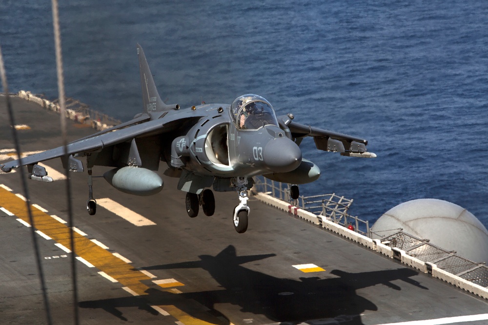 U.S. Marine Harrier pilots ensure landing skills are sharp at sea