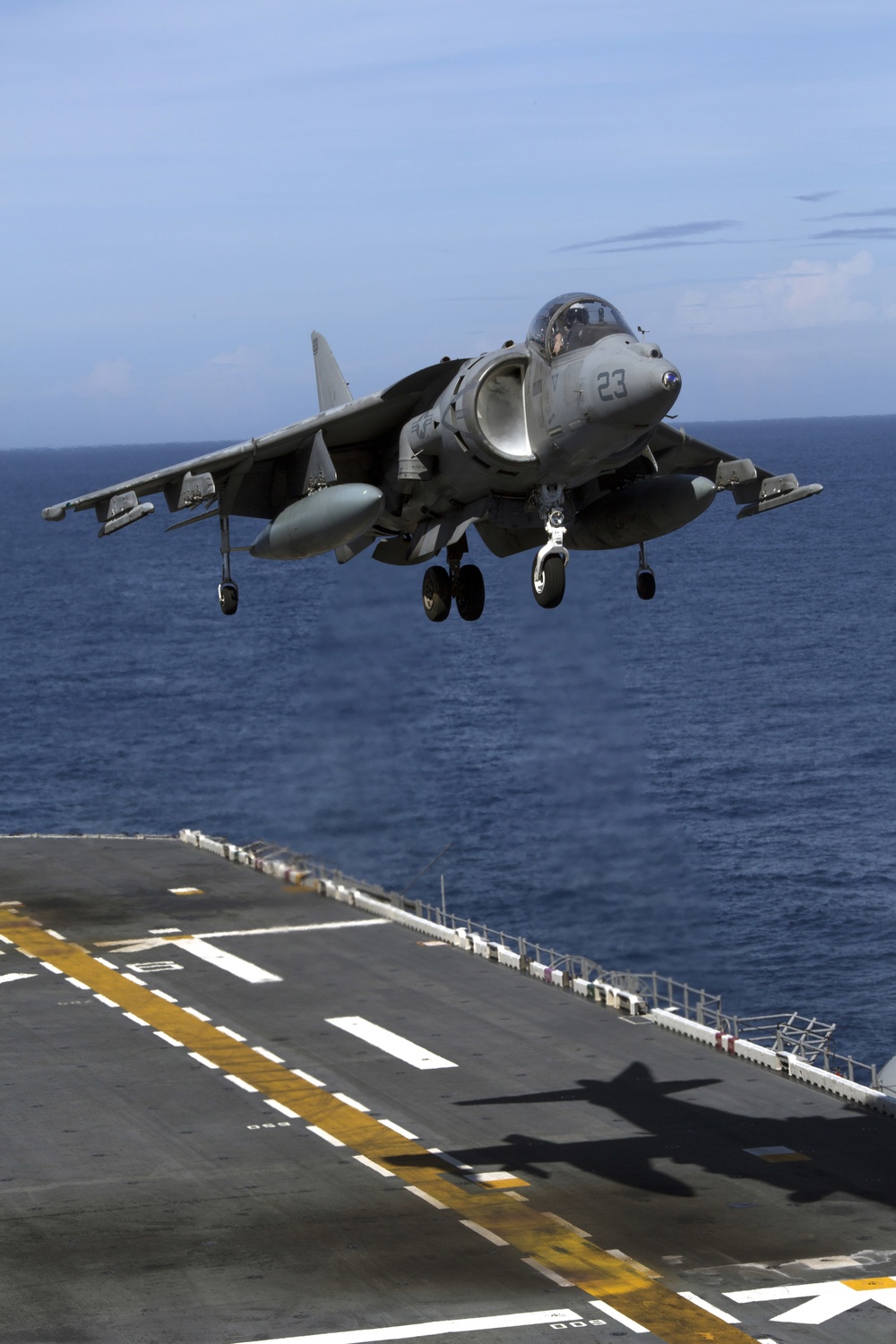 U.S. Marine Harrier pilots ensure landing skills are sharp at sea