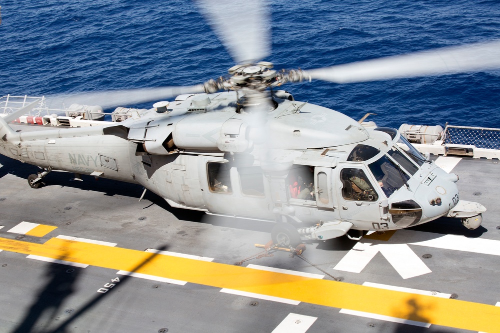 U.S. Marine Harrier pilots ensure landing skills are sharp at sea