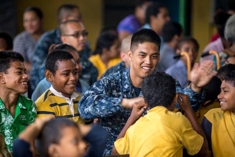 Service members enjoy a community engagement project in Suva, Fiji during Pacific Partnership 2015