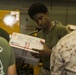 Mail Cal: U.S. Marines deployed at sea receive gifts from home
