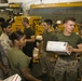 Mail Cal: U.S. Marines deployed at sea receive gifts from home