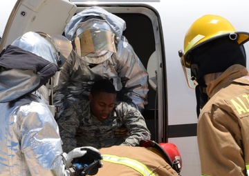 Altus AFB firefighters practice egress training on T1 Jayhawk Aircraft