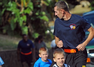Celebrating 240 years of selfless service with running shoes, family, fun
