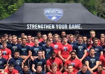 Marines put New England high school football players through their paces during the Semper Fidelis All-American Camp