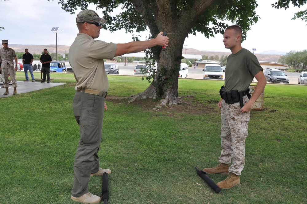 Marines endure pepper spray during training for SAF aboard MCLB Barstow