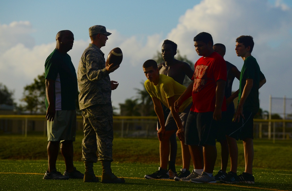Game changer: Airman gives back, grows as mentor to high school football team