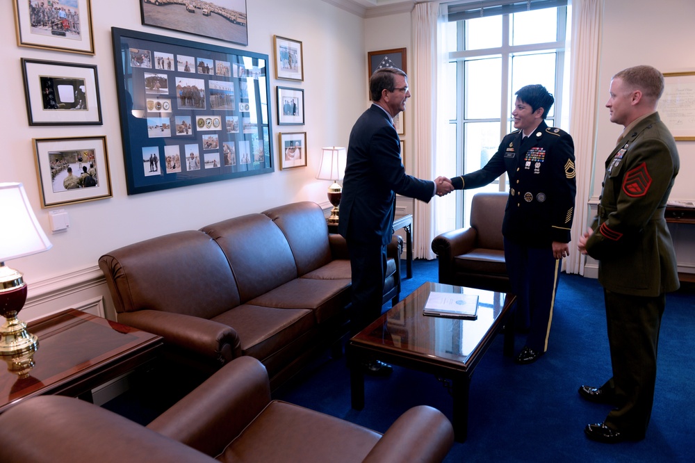 Secretary of defense congratulates the Junior and Senior Enlisted Service Member of the Year