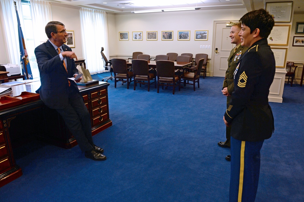 Secretary of defense talks with the Junior and Senior Enlisted Service Member of the Year