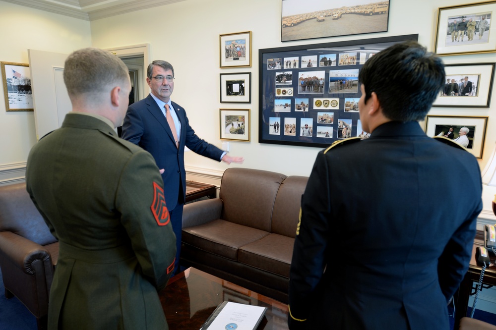 Secretary of defense talks with the Junior and Senior Enlisted Service Member of the Year