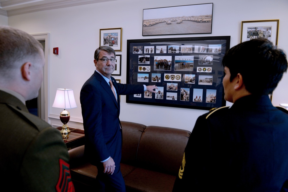 Secretary of defense talks with the Junior and Senior Enlisted Service Member of the Year