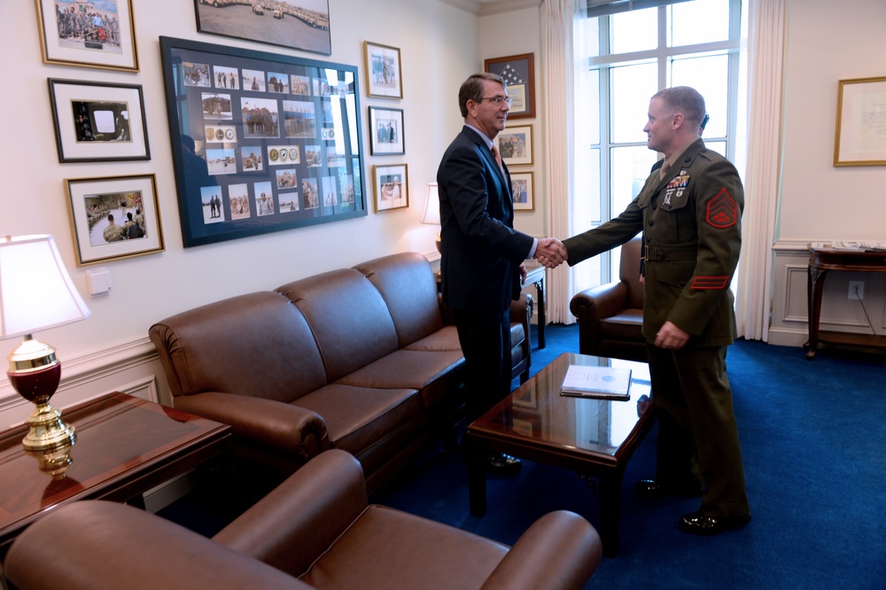 Secretary of defense congratulates the Junior and Senior Enlisted Service Member of the Year