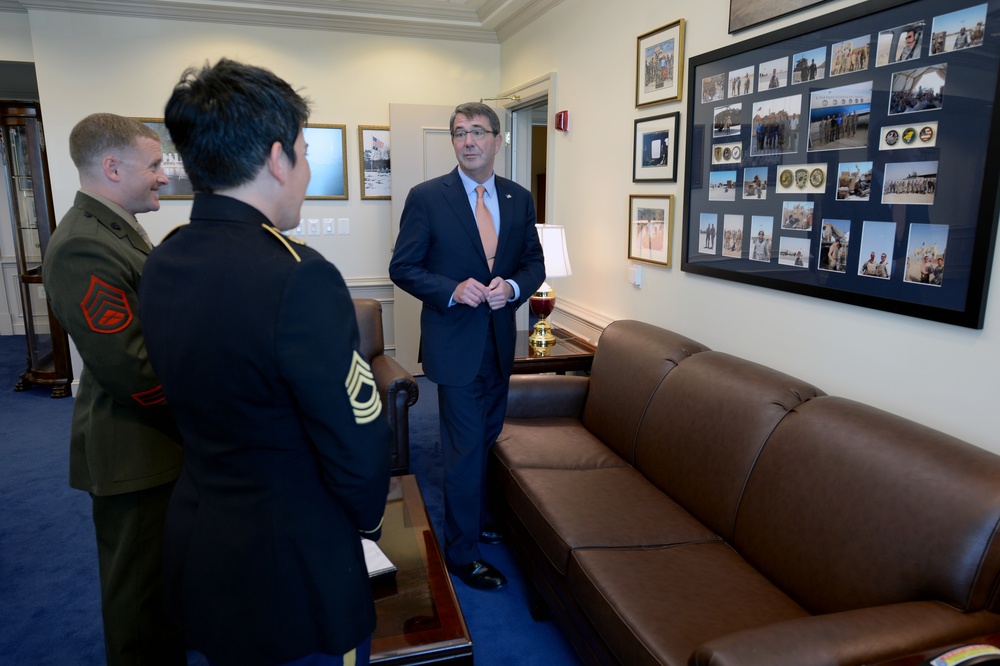 Secretary of defense talks to the Junior and Senior Enlisted Service Member of the Year