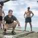 POW/MIA recovery team members build a searching grid