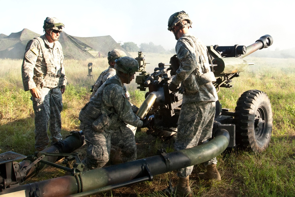 160th Field Artillery members ready the big guns