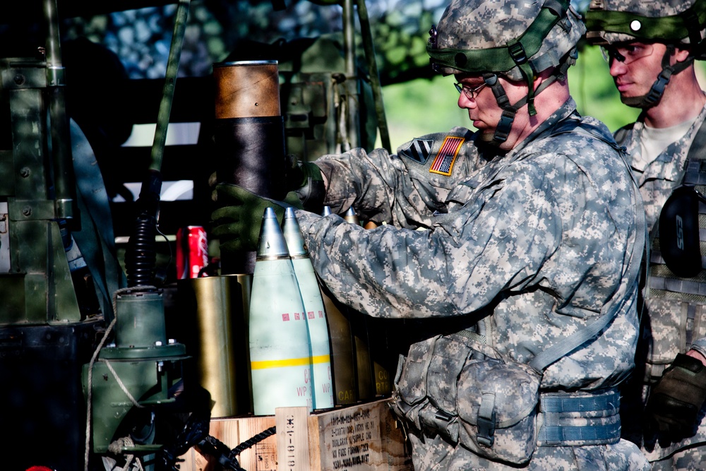 160th Field Artillery members ready the big guns