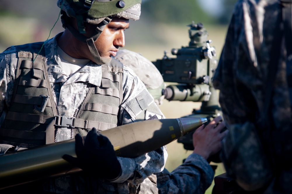 160th Field Artillery members ready the big guns