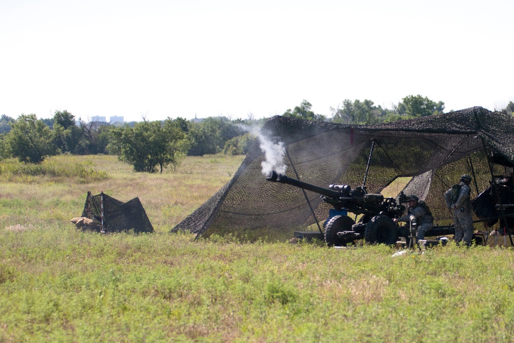 160th Field Artillery members ready the big guns