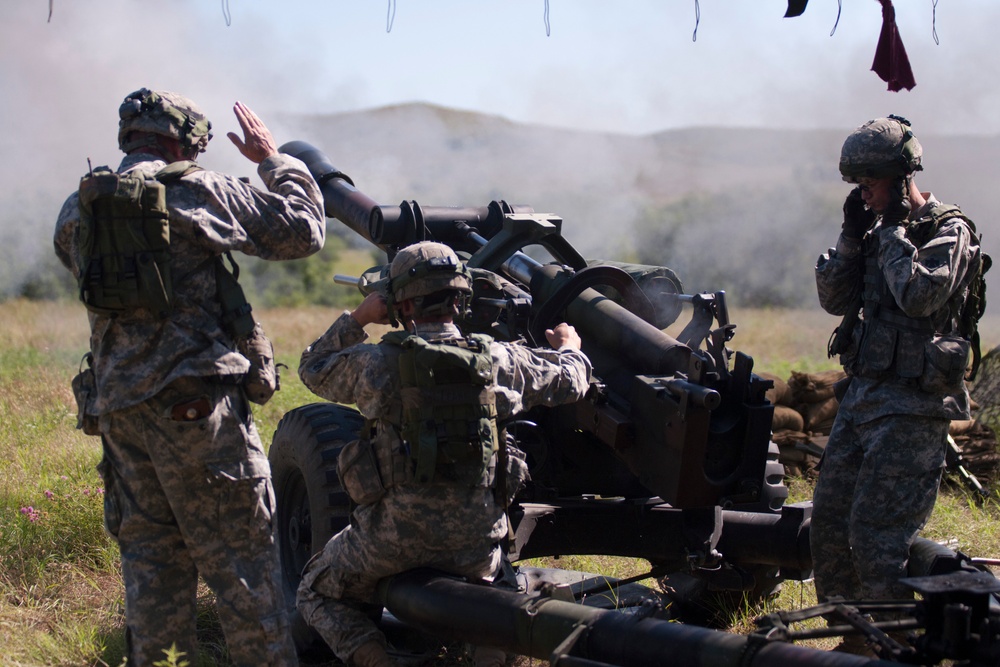 160th Field Artillery members ready the big guns