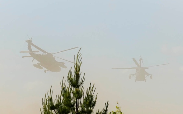Apache helicopters provide air support for multinational forces during Saber Strike 15